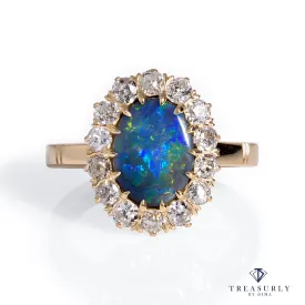 An exquisite Antique Victorian Lightning Ridge Black Opal Diamond Cluster Cocktail Ring