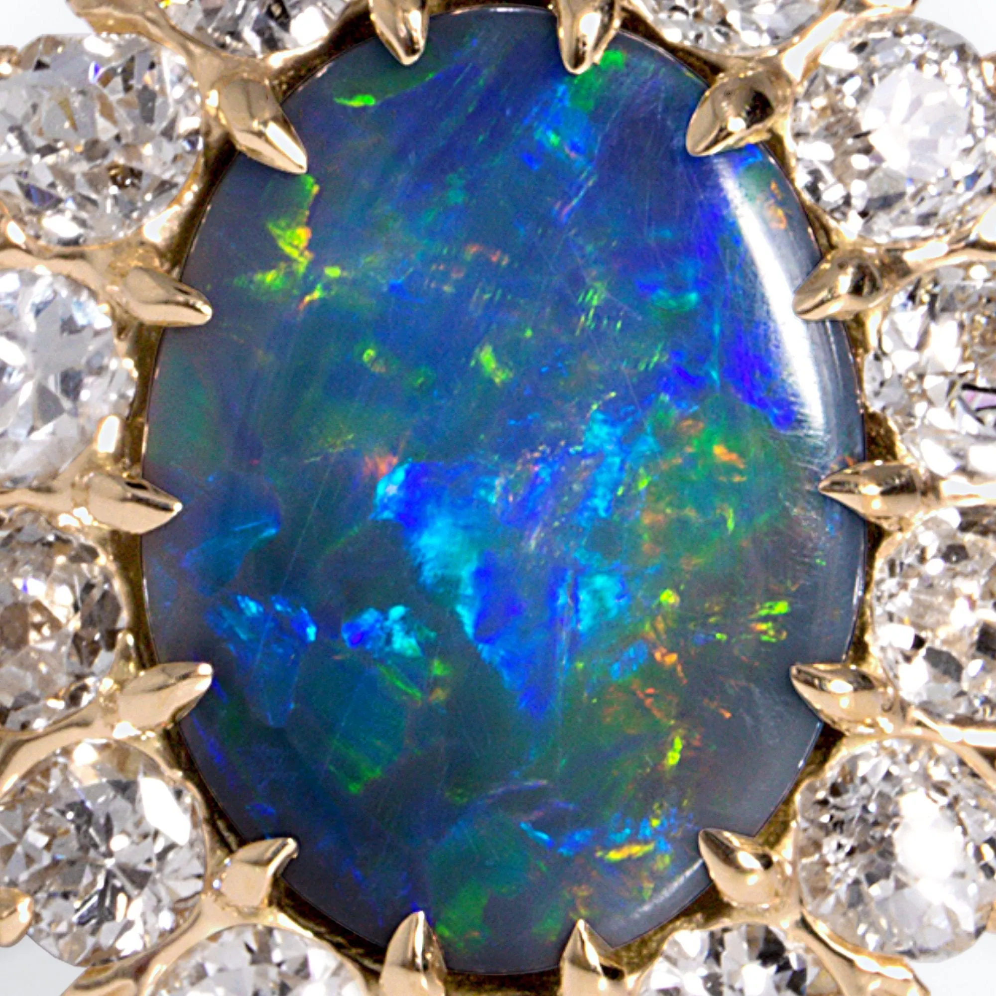 An exquisite Antique Victorian Lightning Ridge Black Opal Diamond Cluster Cocktail Ring