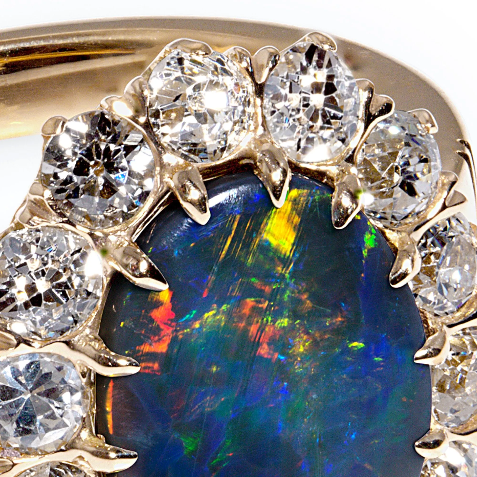 An exquisite Antique Victorian Lightning Ridge Black Opal Diamond Cluster Cocktail Ring