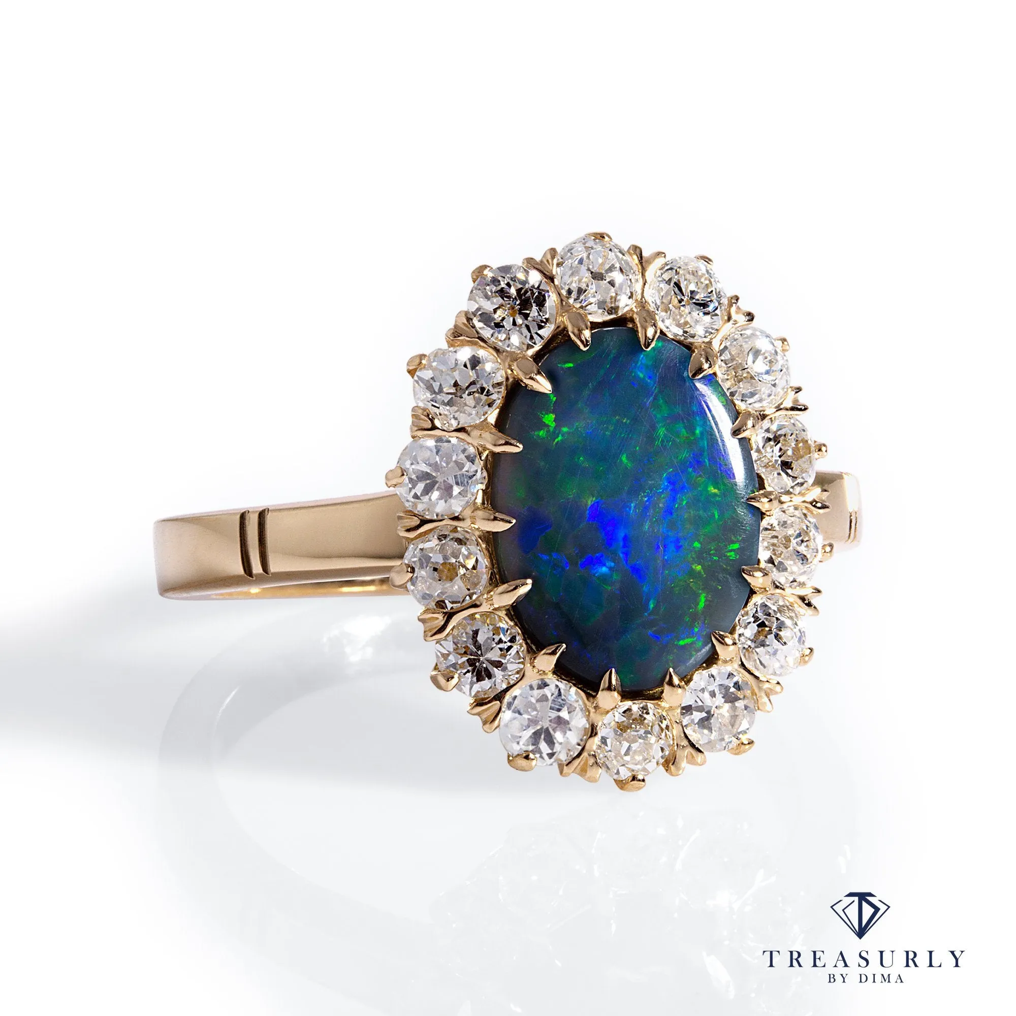 An exquisite Antique Victorian Lightning Ridge Black Opal Diamond Cluster Cocktail Ring